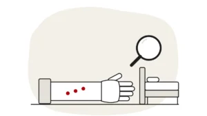 Illustration of a forearm with three bite marks beside a bed, with an empty magnifying glass showing no bed bugs found